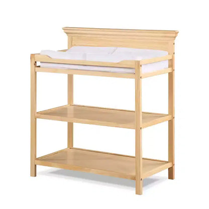 Table à langer universelle avec étagères ouvertes, finition non toxique et design transitoire pour chambre de bébé
