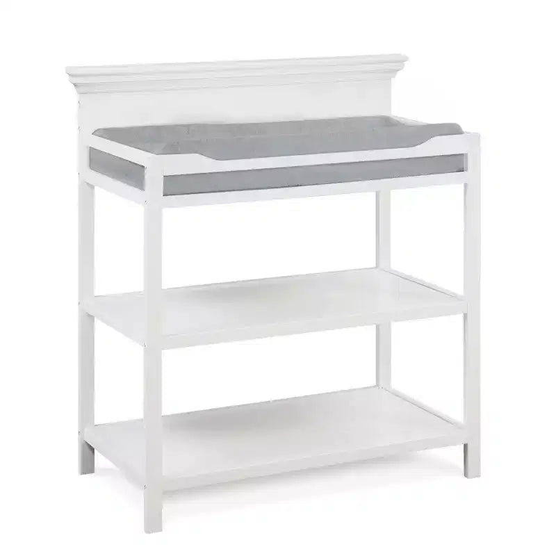 Table à langer universelle avec étagères ouvertes, finition non toxique et design transitoire pour chambre de bébé