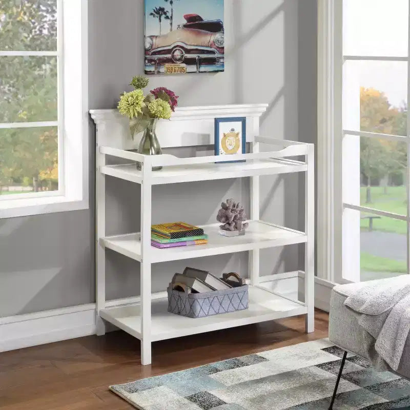 Table à langer universelle avec étagères ouvertes, finition non toxique et design transitoire pour chambre de bébé
